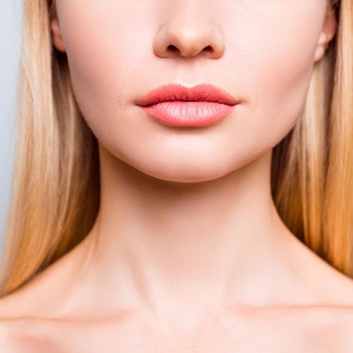 woman's face and neck area with clear smooth skin